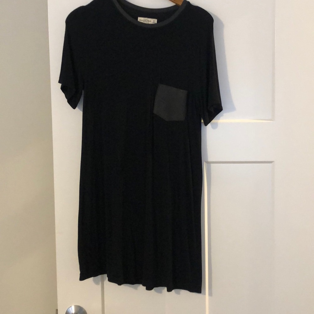 Black tee shirt dress with leather pocket